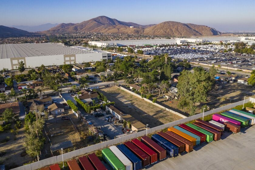 FONTANA, CA - AUGUST 13, 2019: In the past 5 years, hubs of warehouses have surrounded neighborhoods squeezing out residents on August 13, 2019 in Fontana, California. (Brian Vander Brug/Los AngelesTimes)