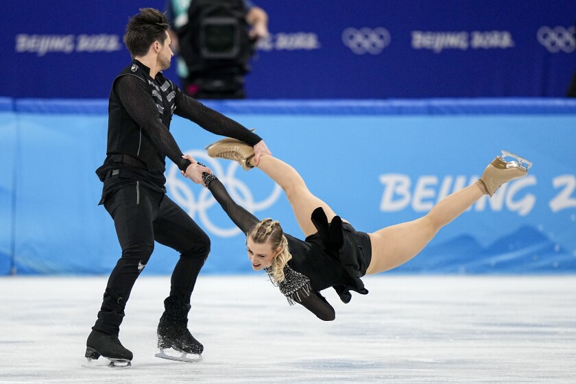 Madison Hubbell, right, and Zachary Donohue, of the United States, compete during the ice dance team program in the figure skating competition at the 2022 Winter Olympics, Friday, Feb. 4, 2022, in Beijing. (AP Photo/David J. Phillip)