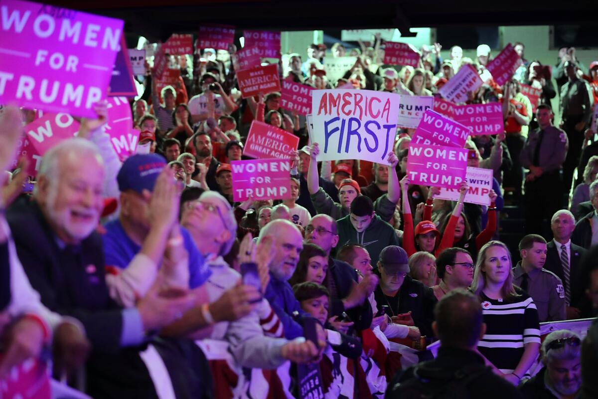 Supporters cheer for Donald Trump at a rally in Scranton, Pa., on Monday night.