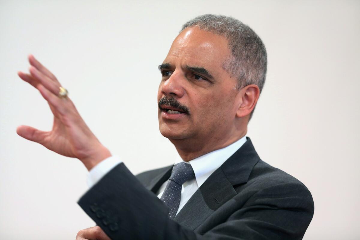 Atty. Gen. Eric Holder addresses the Police Executive Research Forum's National Summit on Illegal Drugs in Washington.