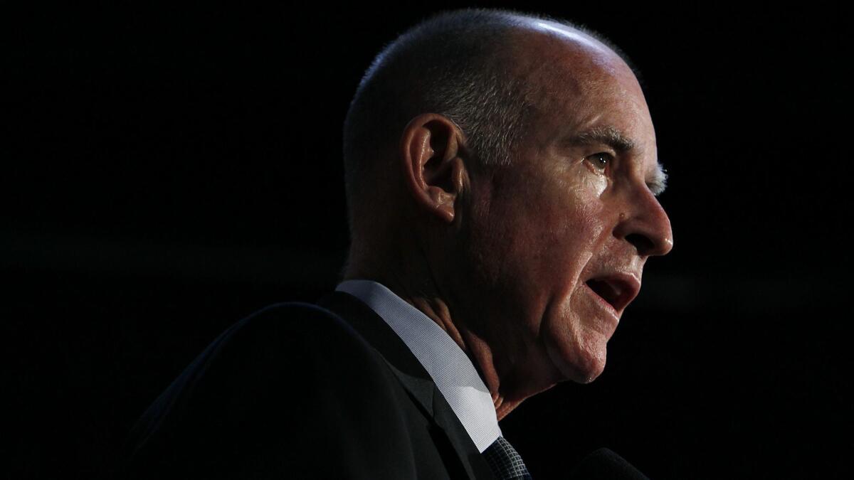 Jerry Brown talks with the media in Oakland, Calif. on Nov. 3, 2010.