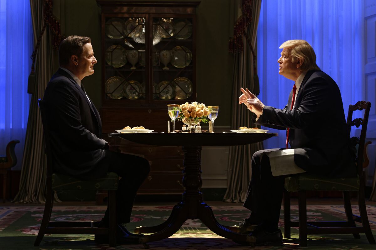 Jeff Daniels as James Comey, left, and Brendan Gleeson as Donald Trump in "The Comey Rule."