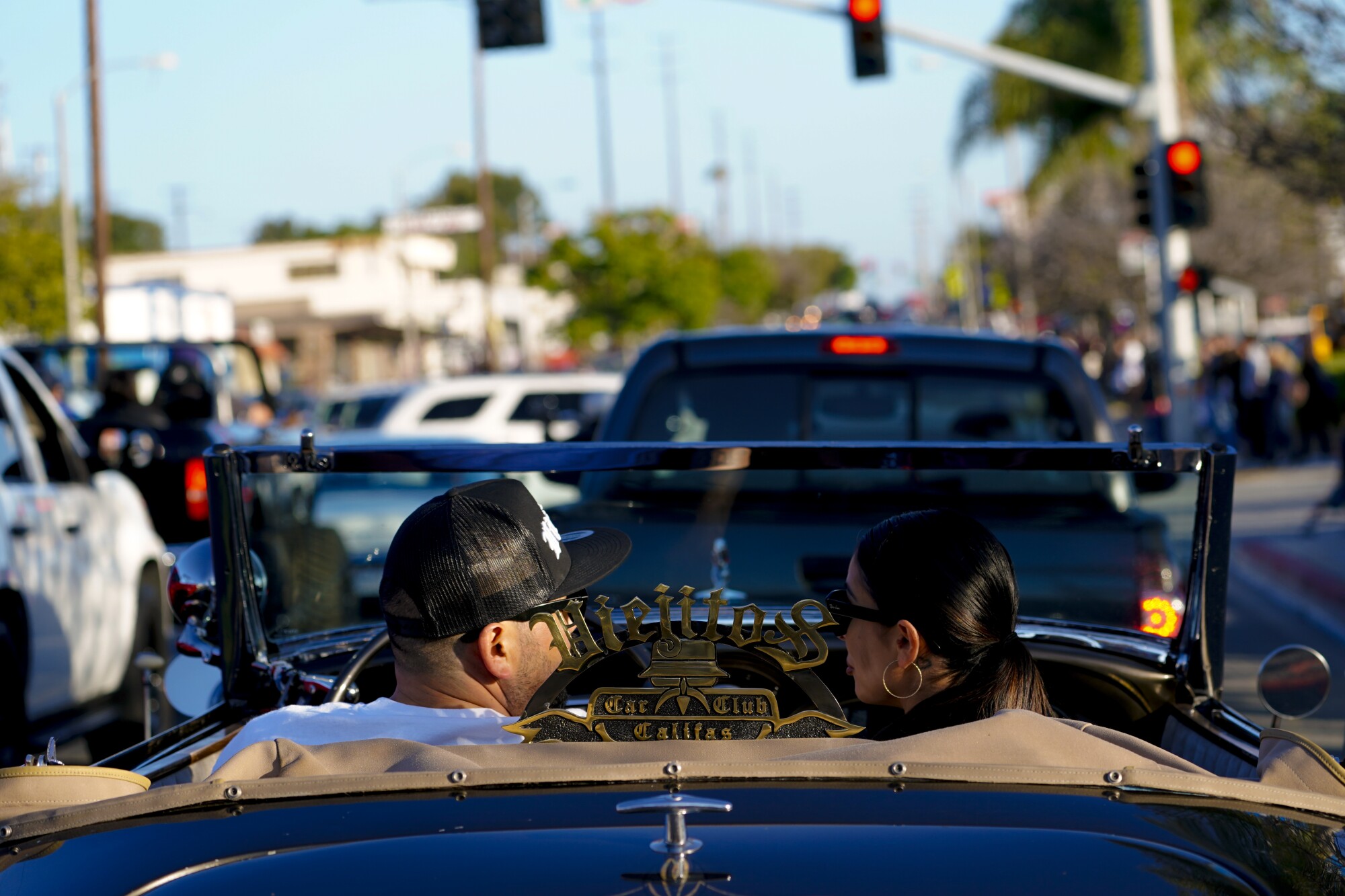 National City, CA - May 06: Customized lowriders cruise down Highland Avenue on Friday, May 6, 2022 in National City, CA.