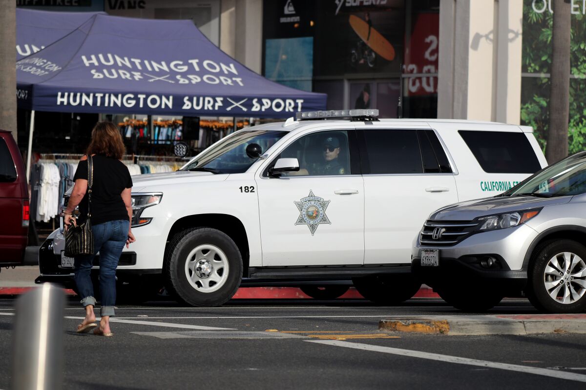 A California State Park Peace Officer at PCH and Main St. in Huntington Beach.