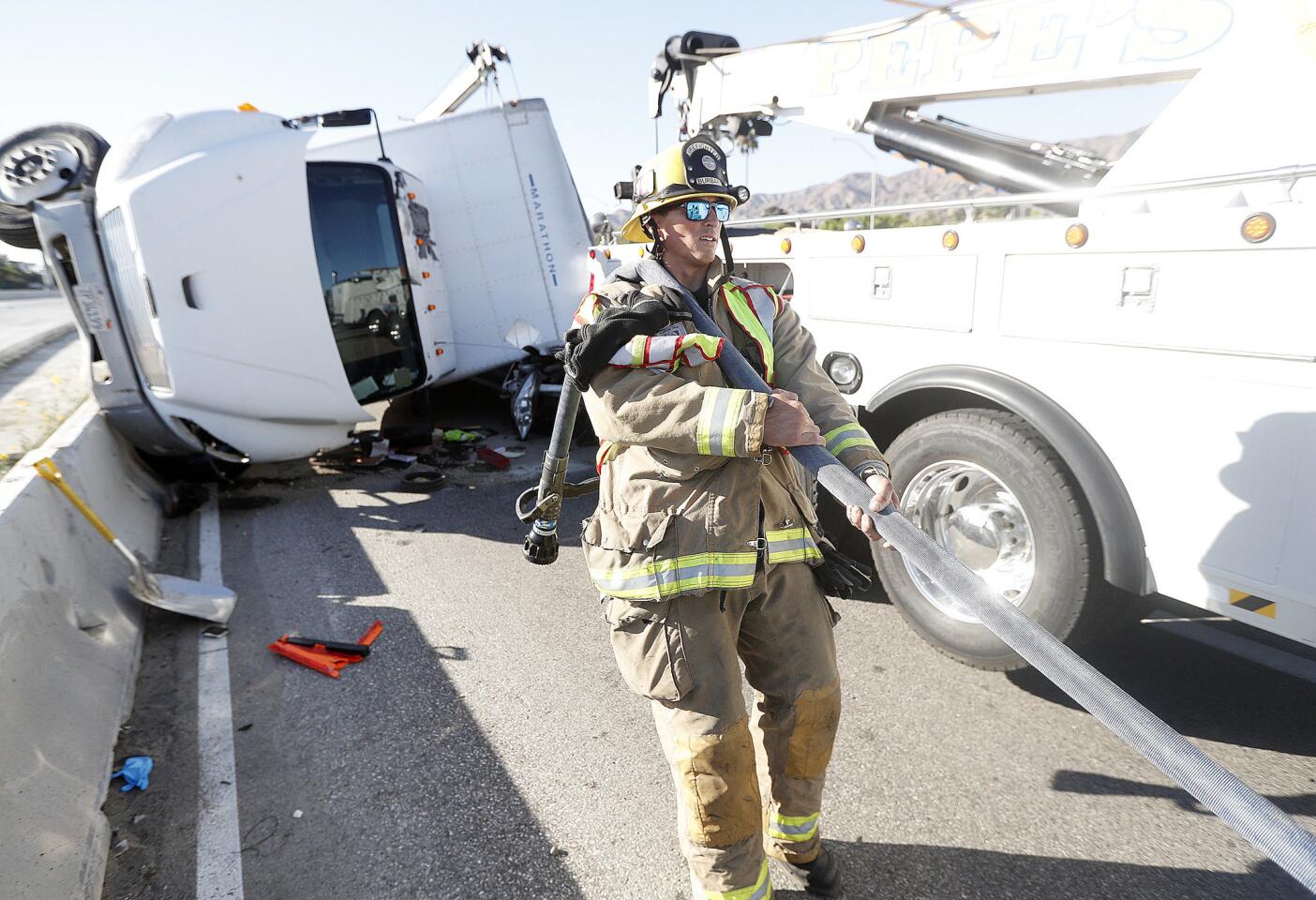 Photo Gallery: Box truck and car tangle at southbound Interstate 5 exit at Burbank Boulevard