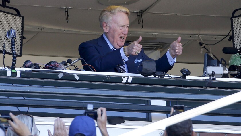 Dodgers broadcaster Vin Scully gives fans at AT&T Park in San Francisco the thumbs-up on Saturday.