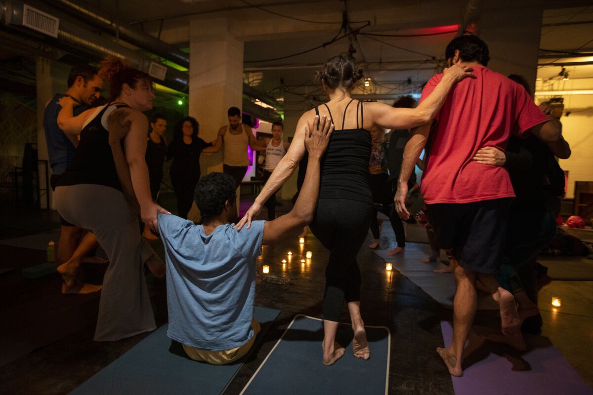 Obi Ndefo in yoga class