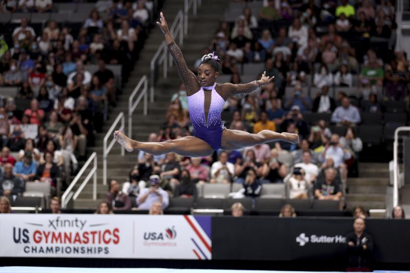 Simone Biles competes in the floor exercise at the U.S. Gymnastics Championships, Friday, Aug. 25, 2023, in San Jose, Calif. (AP Photo/Jed Jacobsohn)
