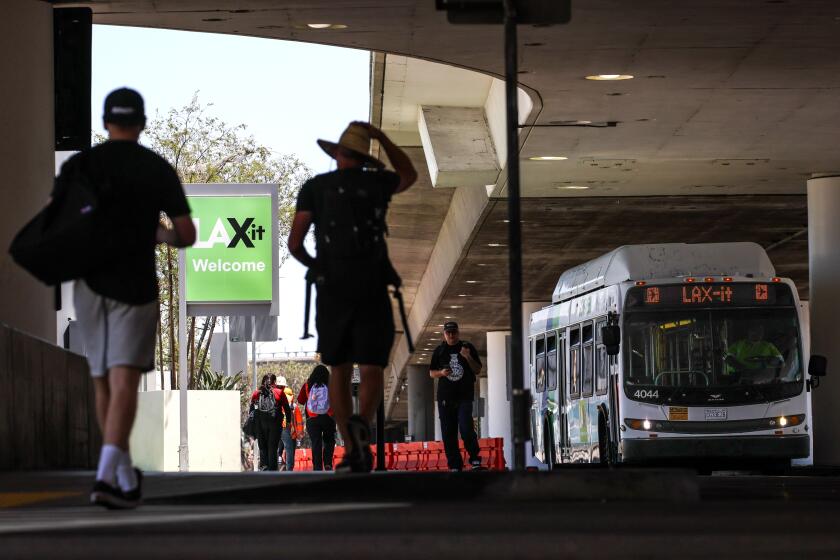 Los Angeles, CA, Monday, July 29, 2024 - The opening of the "LAXit" ride-hail lot in 2019 caused a frenzy in Los Angeles as travelers tried to navigate a clunky system to order a ride to their final destination that, for many, was too much work after a long flight. Nearly five years later, travelers have continued to struggle.(Robert Gauthier/Los Angeles Times)