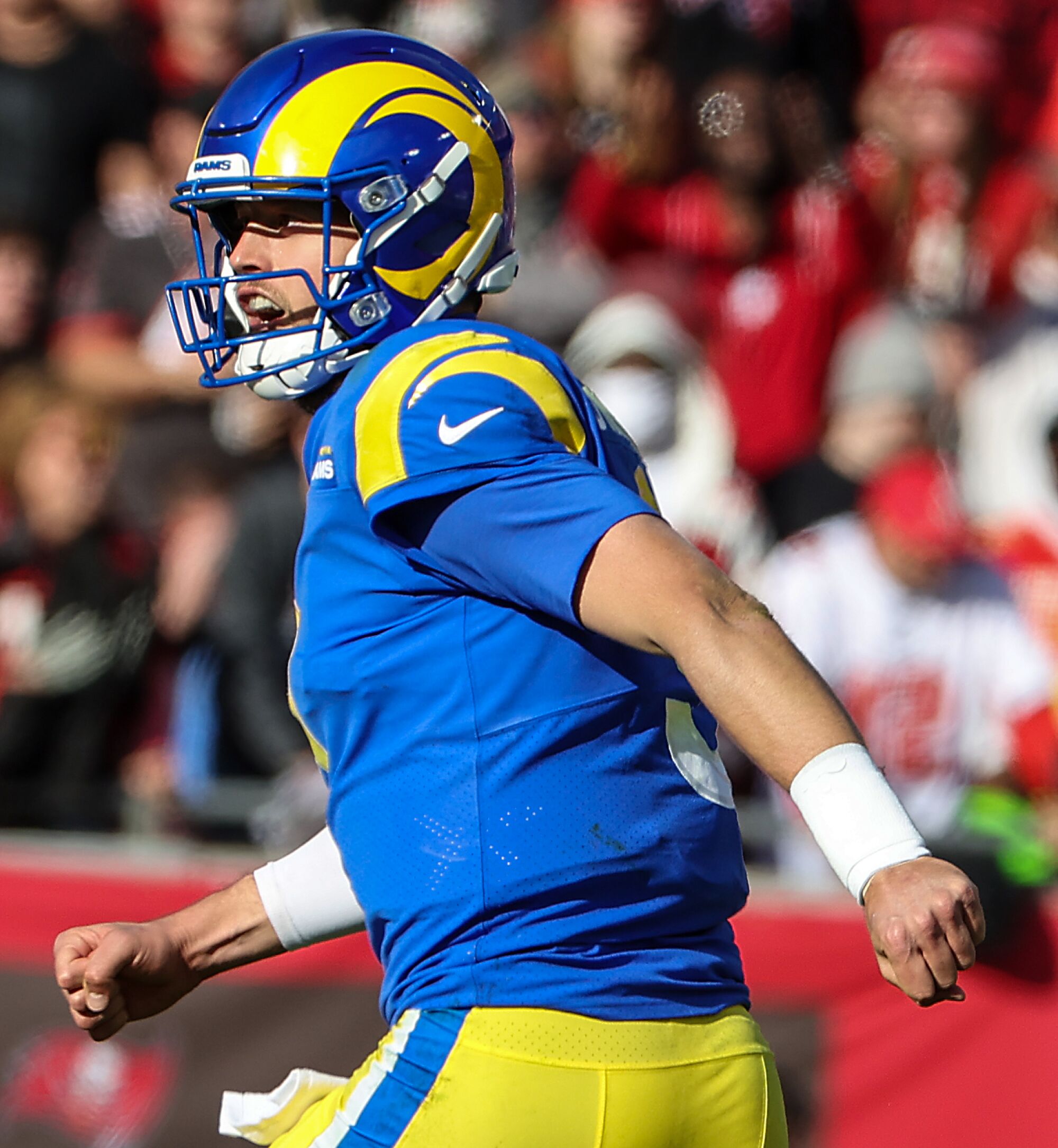 Rams quarterback Matthew Stafford celebrates after throwing a second-quarter touchdown pass to Cooper Kupp.