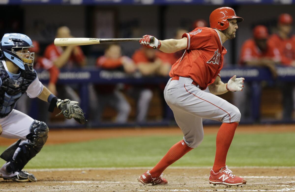 Angels third baseman Kyle Kubitza follows through on a run-scoring single against the Rays in the seventh inning Thursday night in Tampa.