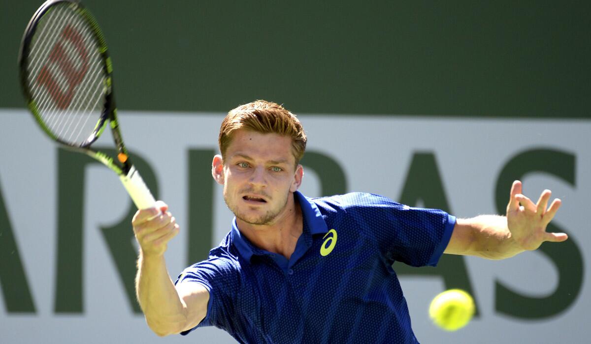 David Goffin in action against Marin Cilic during their quarterfinal match at the BNP Paribas Open tennis tournament in Indian Wells on Thursday.