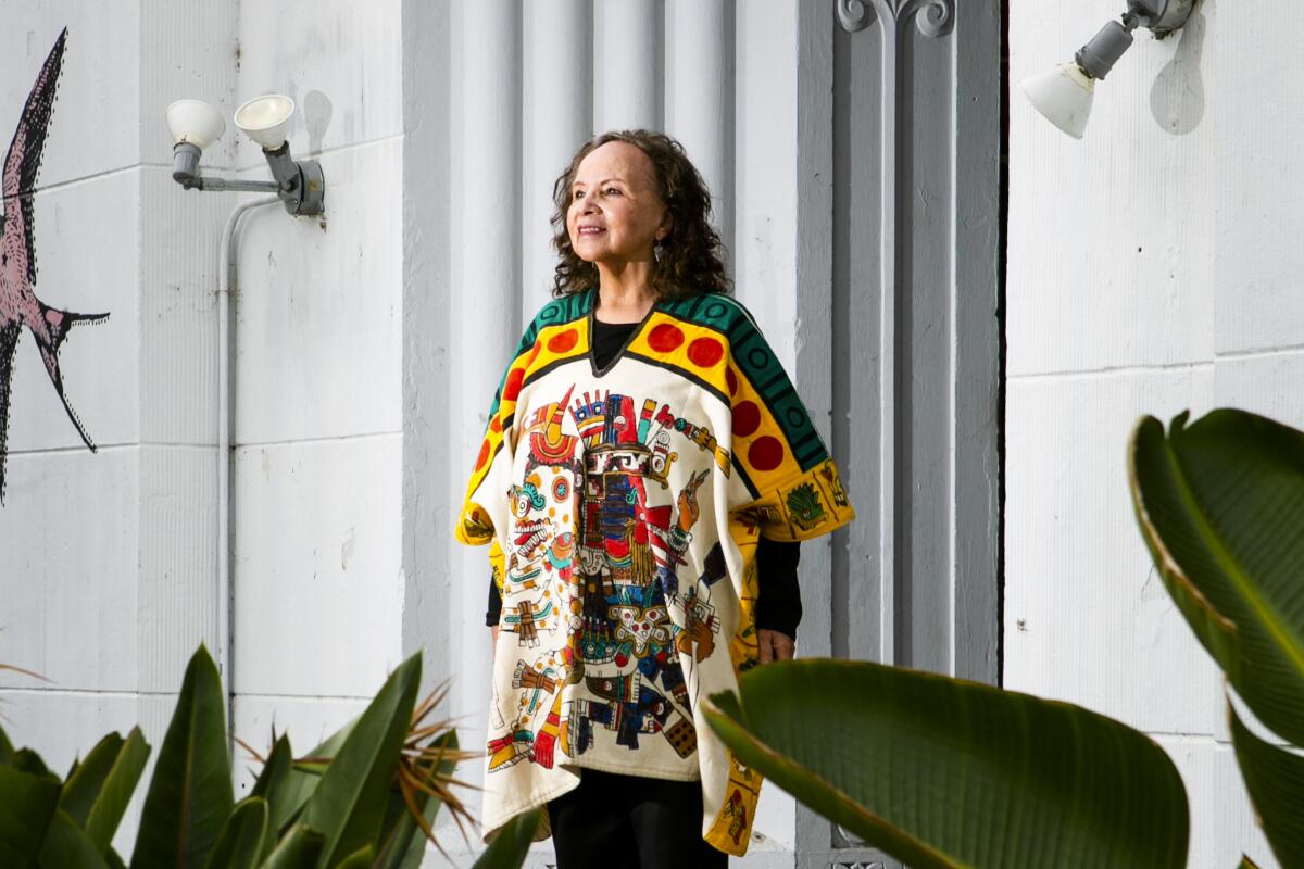 Martha Ramirez-Oropeza in a colorful poncho.