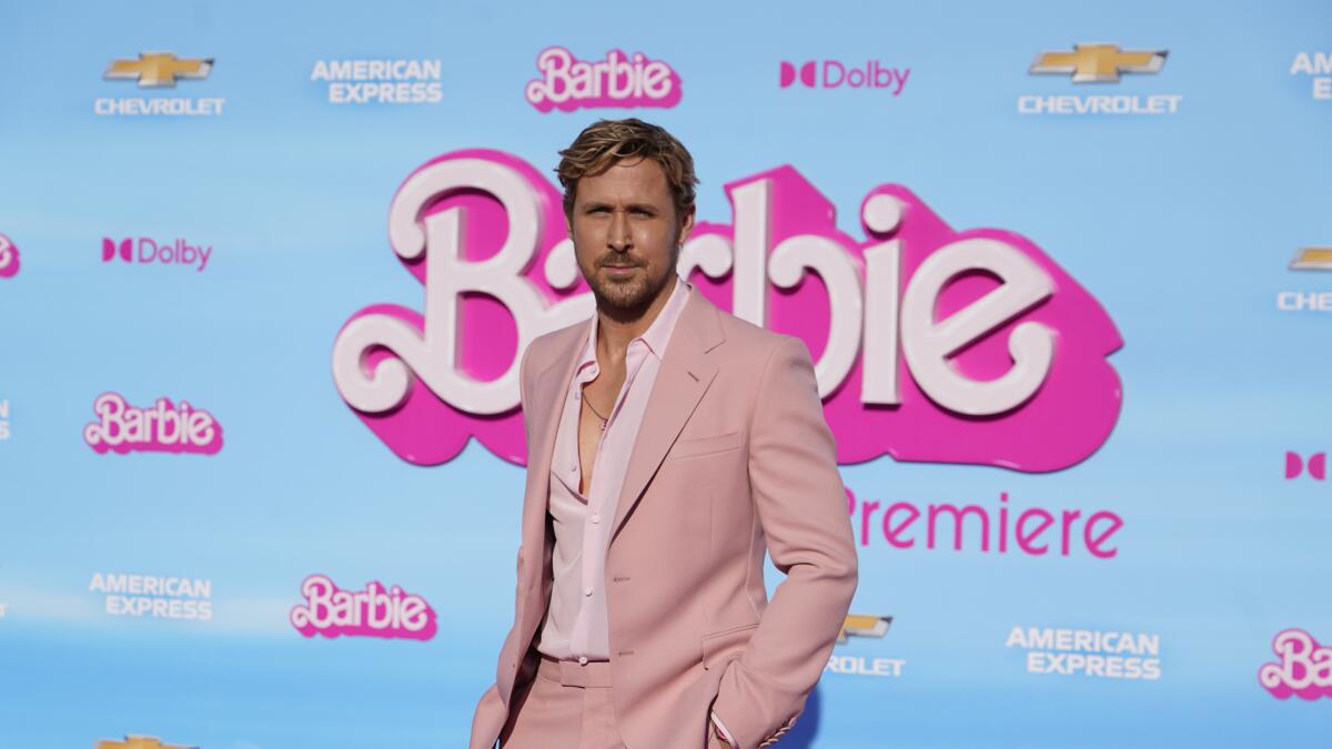 barbie movie with blue and pink dress