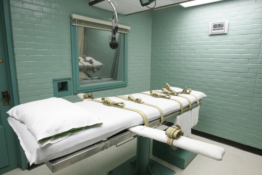 FILE - The state of Texas execution chamber in Huntsville, Texas, is pictured on May 27, 2008. A group of Texas death row inmates filed a federal lawsuit Thursday, Jan. 26, 2023, against the state’s prison system over its policy of permanently holding in solitary confinement all prisoners who are awaiting execution. (AP Photo/Pat Sullivan, File)