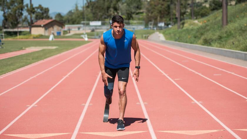 U.S. Paralympian Trenten Merrill stands on the track.