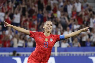 Alex Morgan celebrates after scoring during a World Cup semifinal against England on July 2, 2019.