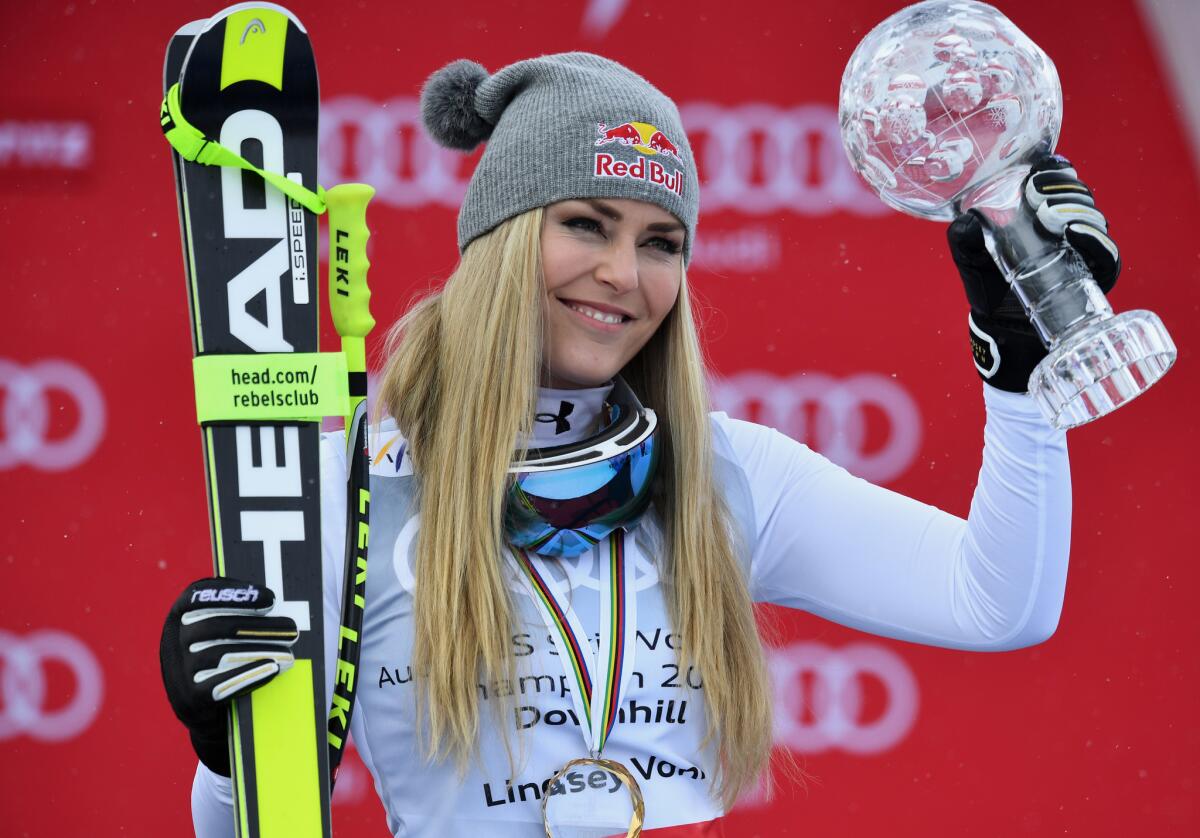 Lindsey Vonn poses with the Women's World Cup downhill Crystal Globe on Wednesday.