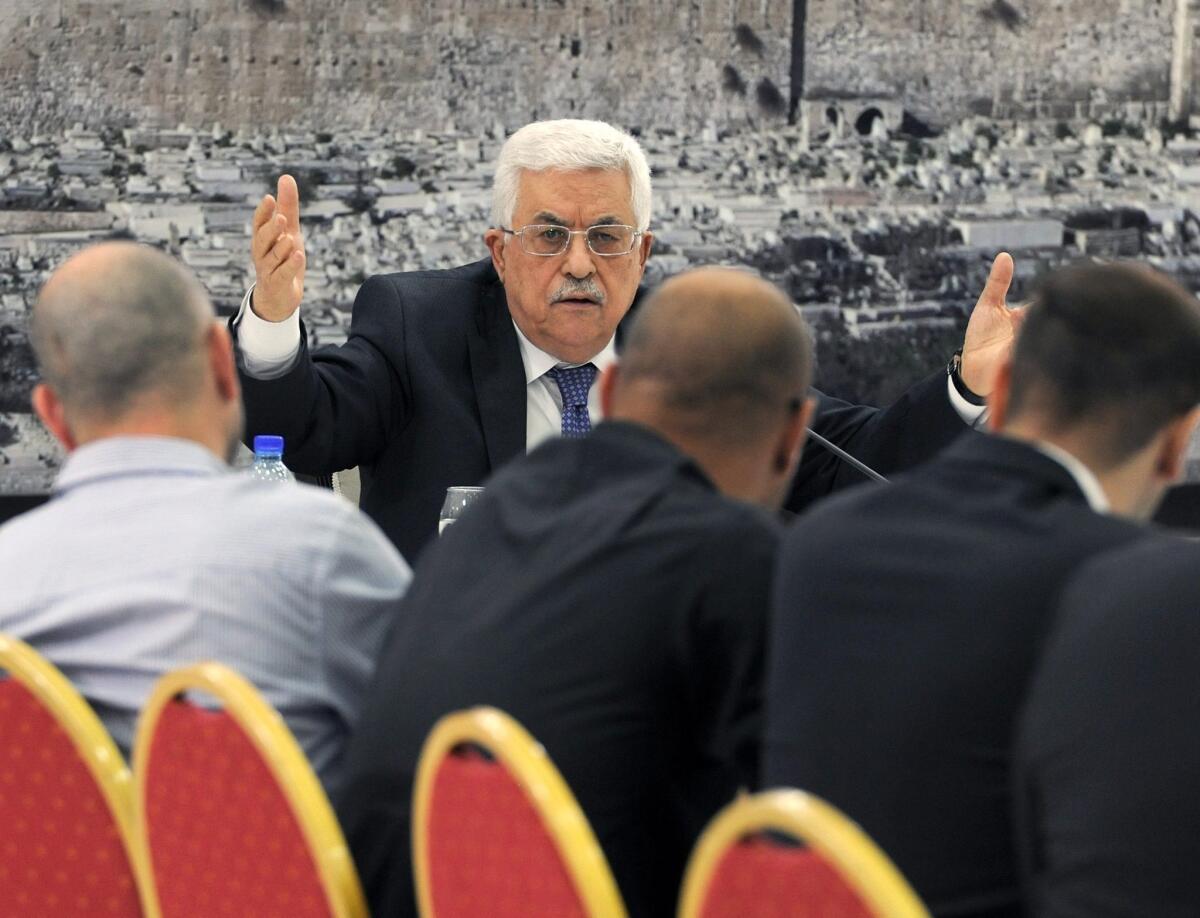 Palestinian Authority President Mahmoud Abbas, center, meets with members of the Palestinian leadership in Ramallah, West Bank.