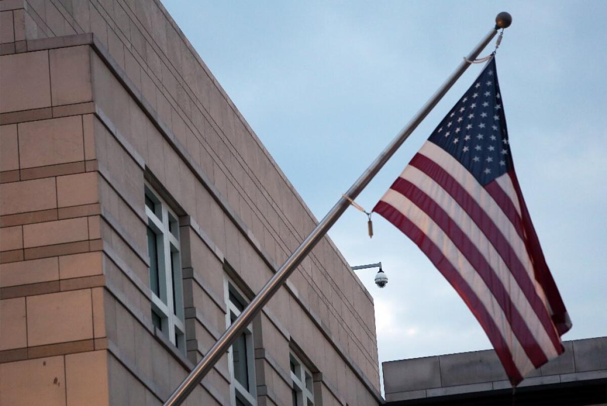 More than 40 U.S. embassies around the world are without ambassadors. Above, an American flag hangs on the U.S. embassy in Berlin.