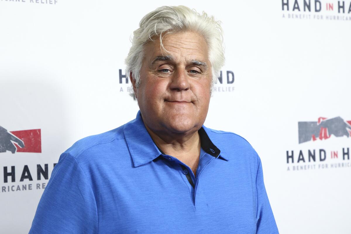 FILE - Jay Leno attends the Hand in Hand: A Benefit for Hurricane Harvey Relief in Los Angeles on Sept. 12, 2017. Jay Leno suffered burns in a weekend fire at the car enthusiast's garage but said Monday that he was doing OK, according to reports. Leno, 72, had been set to appear at a financial conference in Las Vegas on Sunday but canceled because of a “serious medical emergency." (Photo by John Salangsang/Invision/AP, File)