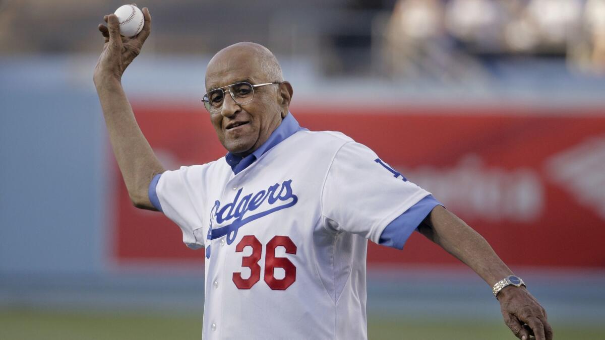 Don Newcombe throws a ceremonial pitch at Dodger Stadium on July 1, 2014.