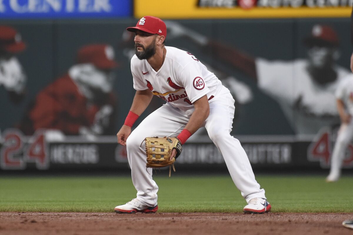 FILE - St. Louis Cardinals second baseman Matt Carpenter takes up his position during the third inning of the team's baseball game against the Atlanta Braves on Aug. 5, 2021, in St. Louis. Carpenter was released by the Texas Rangers from their Triple-A team Thursday, May 19, and became a free agent in a mutual decision because of the lack of opportunity with their big league team. (AP Photo/Joe Puetz, File)