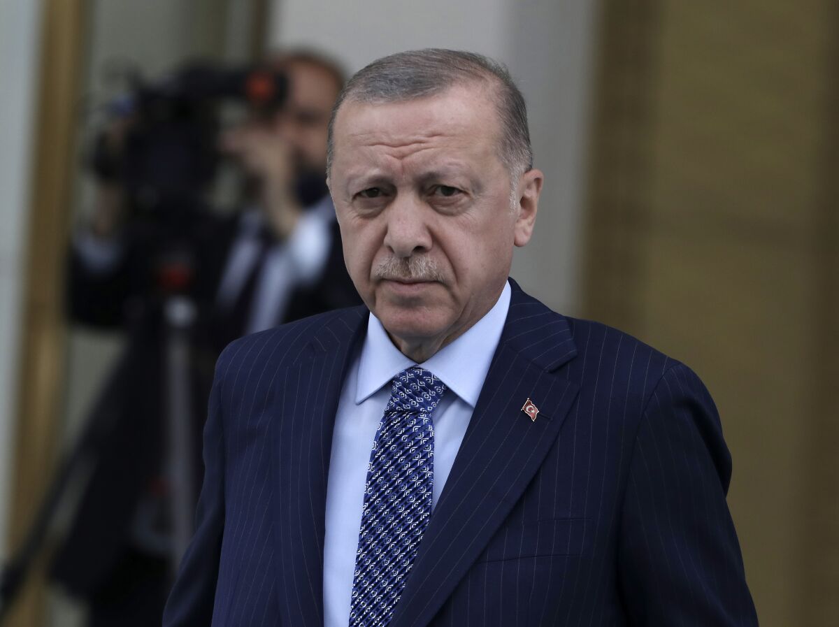 Turkish President Recep Tayyip Erdogan arrives for a ceremony at the presidential palace, in Ankara, Turkey, Monday, May 16, 2022. Erdogan has thrown a spanner in the works of Sweden and Finland's historic decisions to seek NATO membership, declaring that he cannot allow them to join due to their alleged support of Kurdish militants and other groups that Ankara says threaten its national security. (AP Photo/Burhan Ozbilici)