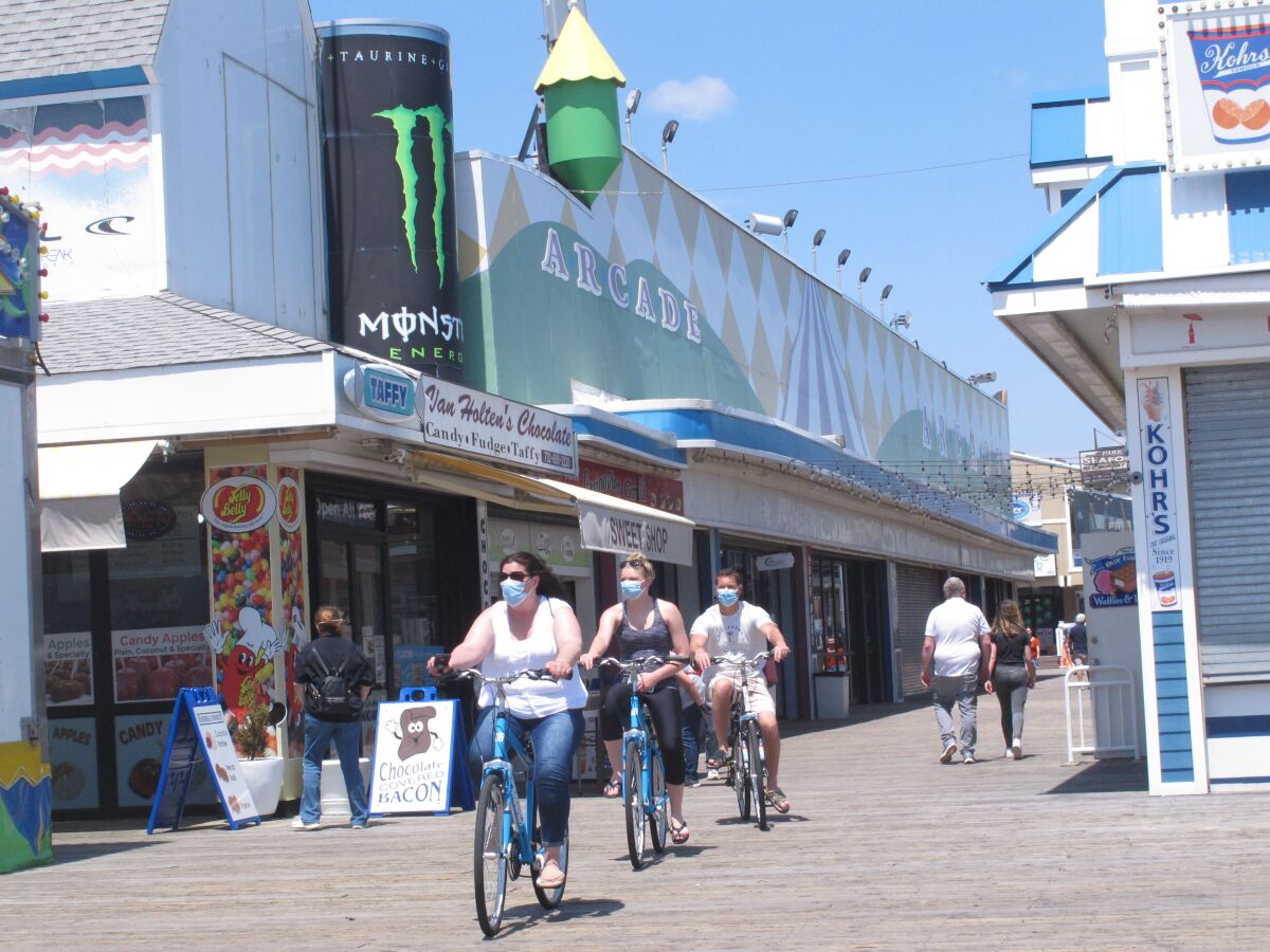 Bicyclists ride on the boardwalk in Seaside Heights, N.J., on May 15. 