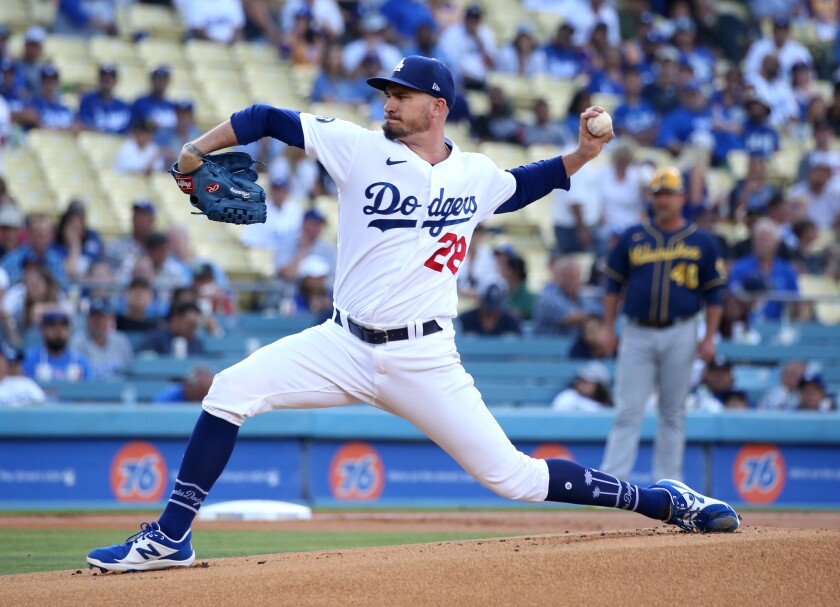 Dodgers pitcher Andrew Heaney works against the Milwaukee Brewers.