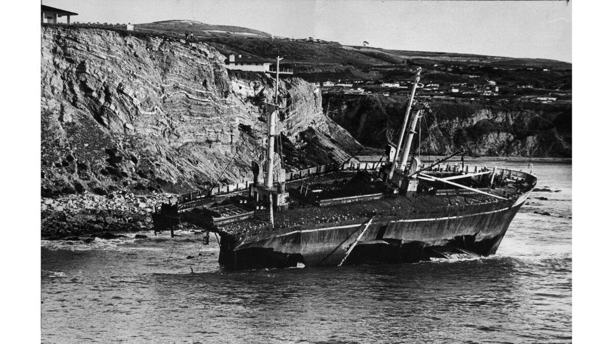Jan. 18, 1964: The wreckage of the freighter Dominator, gradually being torn apart by the surf below Palos Verdes. The wreck had lured three skin divers to their deaths since the 1961 grounding.