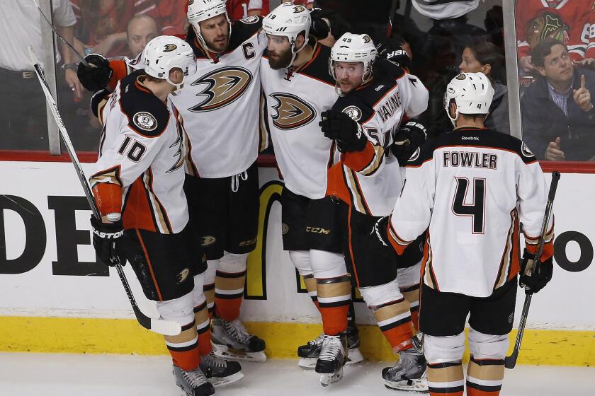 Ducks left wing Patrick Maroon, third from left, celebrates after scoring a goal against the Chicago Blackhawks on Wednesday.