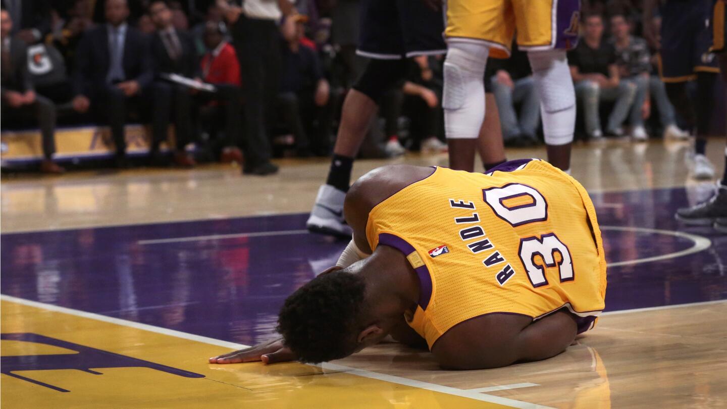 Lakers forward Julius Randle reacts after missing a shot while getting fouled in the closing moments of a 102-100 loss to the Utah Jazz.