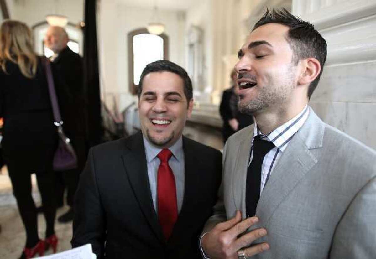 Paul Katami, right, and Jeff Zarillo, left, at a Los Angeles press conference at Vibiana's. 'This is what America is about,' Katami said Tuesday after President Obama announced support for same-sex marriage.