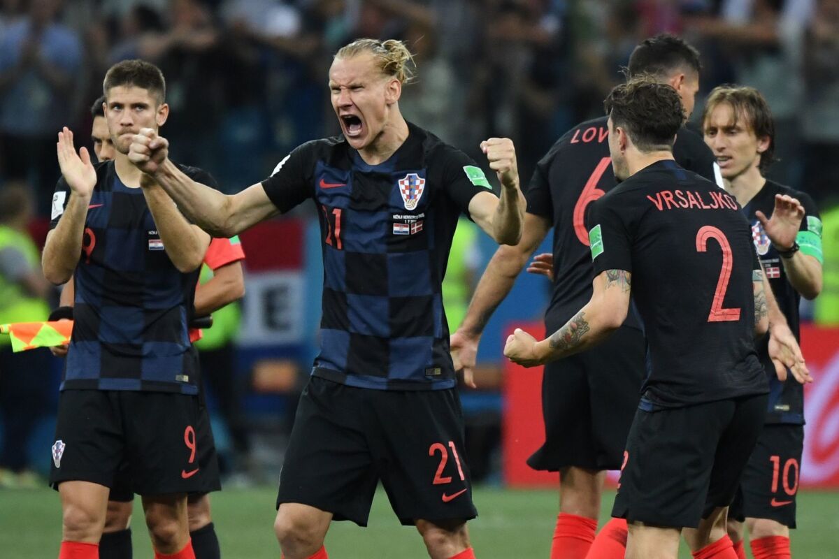 Croatia's defender Domagoj Vida reacts after a teammate scored during the shootout.
