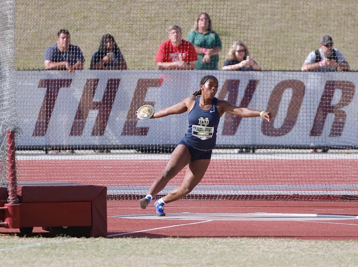 Sherman Oaks Notre Dame junior Aja Johnson competes in the discus at the Mt. SAC Relays.