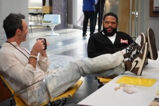 Reid Scott, left, and Anthony Anderson in "black-ish" on ABC.