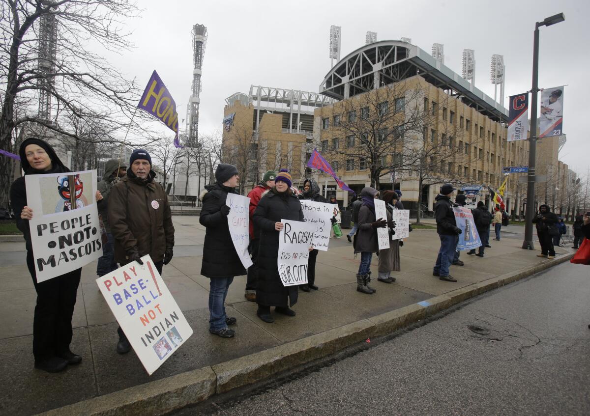 Protesters gather outside Progressive Field in Cleveland, Ohio to protest the Cleveland Indians' mascot on April 4.