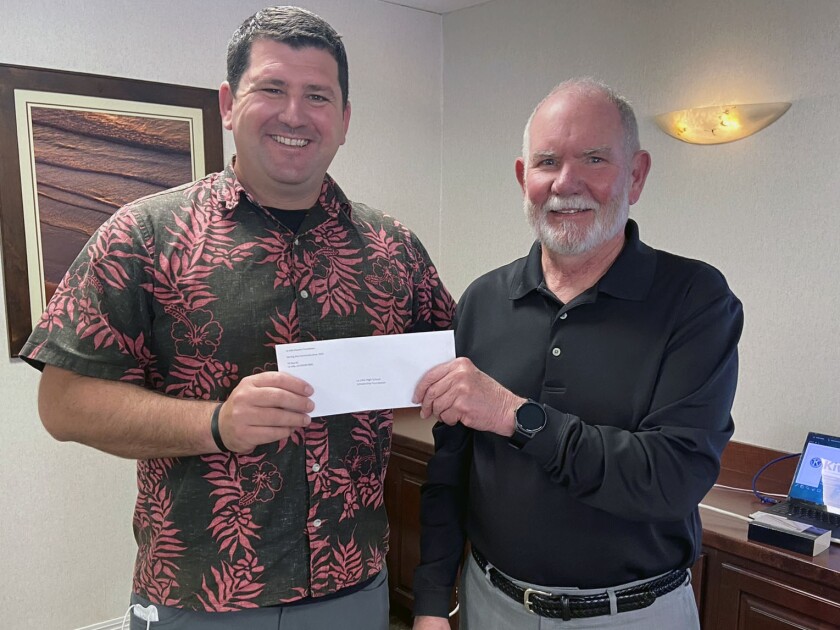 Don Hodges (right), president of the La Jolla Kiwanis Foundation, and Joe Cavaiola, vice principal of La Jolla High School