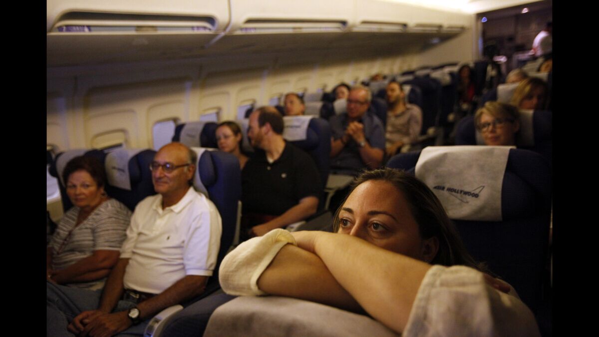 Anna Eliav, foreground, hasn't visited her parents in Greece for four years due to her flying phobia.