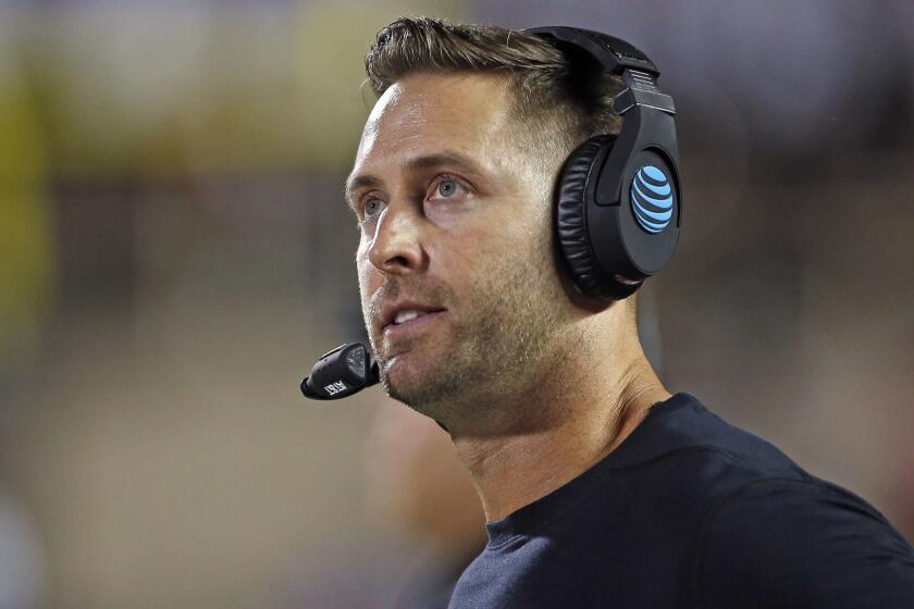Texas Tech coach Kliff Kingsbury looks at the scoreboard during the team's NCAA college football game against Arizona State, Saturday, Sept. 16, 2017, in Lubbock, Texas. (Brad Tollefson/Lubbock Avalanche-Journal via AP)