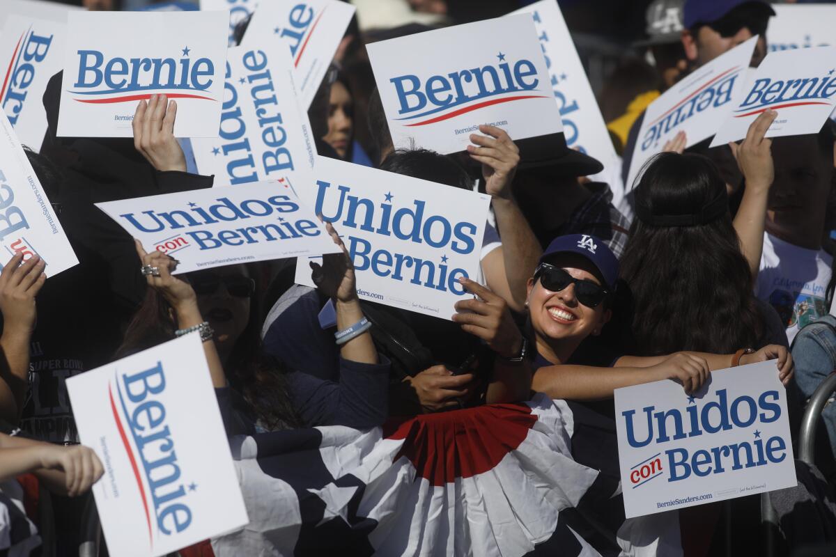 Rally-goers wait for Sanders' arrival. Most speakers before Sanders took the stage spoke Spanish or peppered in into their addresses.