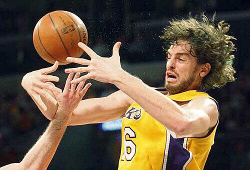 On the loose: Pau fights for a loose ball against the Pacers.