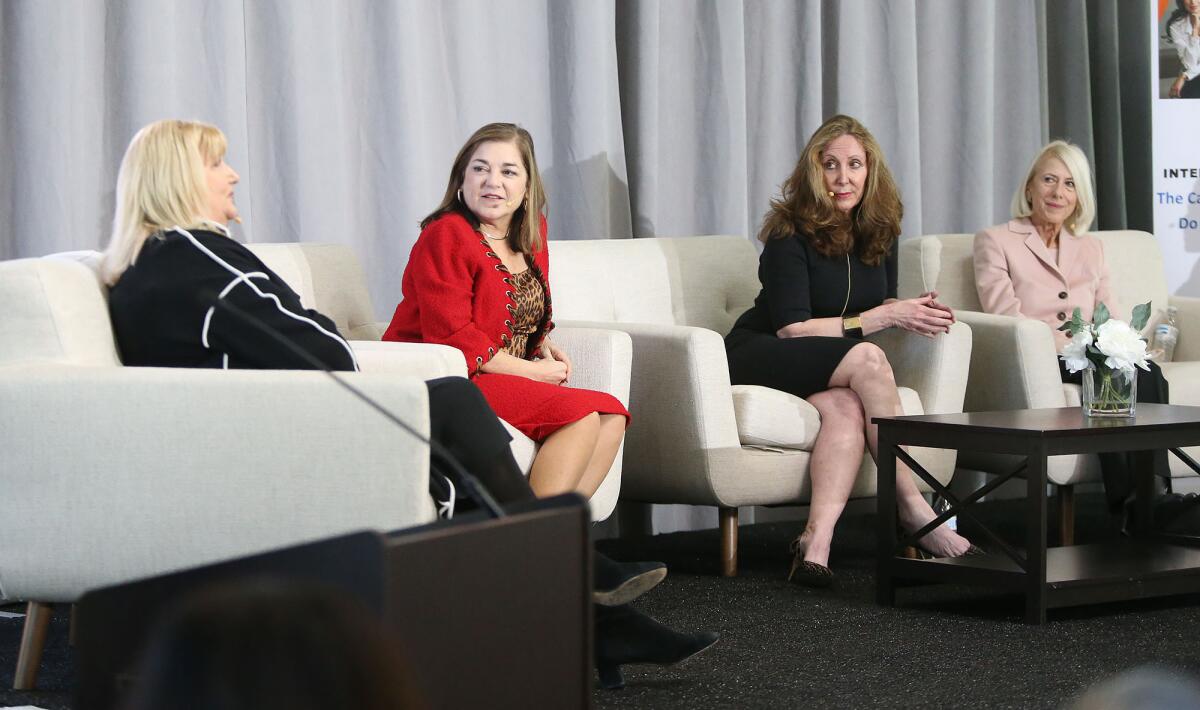 Kerry Phelan, left, president of global franchise management at Lionsgate Entertainment, answers a question from the audience Monday during the second annual Athena40 Global Conversation at UC Irvine. Other panelists are former U.S. Rep. Loretta Sanchez; Dr. Stephanie McClellan, chief medical officer at Tia; and Susan Parks, president and CEO of Orange County United Way.