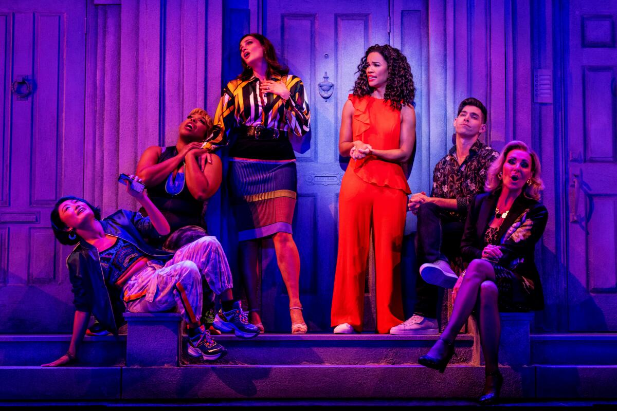 Five women and one man sing on a front stoop in "Company."