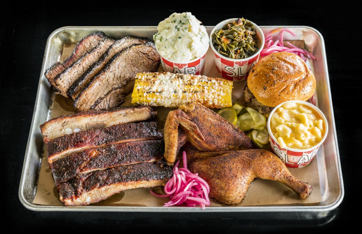 A tray of food from a barbecue restaurant.