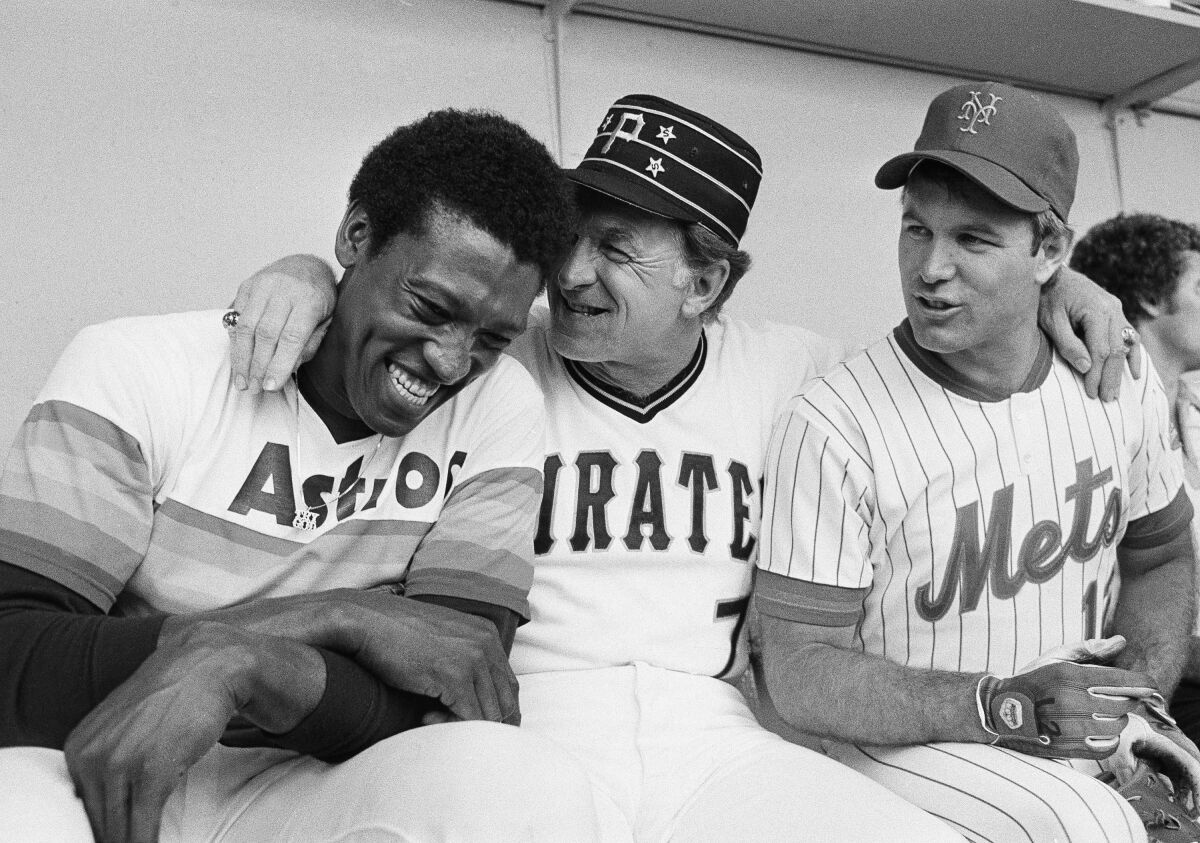 National League manager Chuck Tanner jokes around with Houston pitcher J.R. Richard and New York Mets' John Stearns