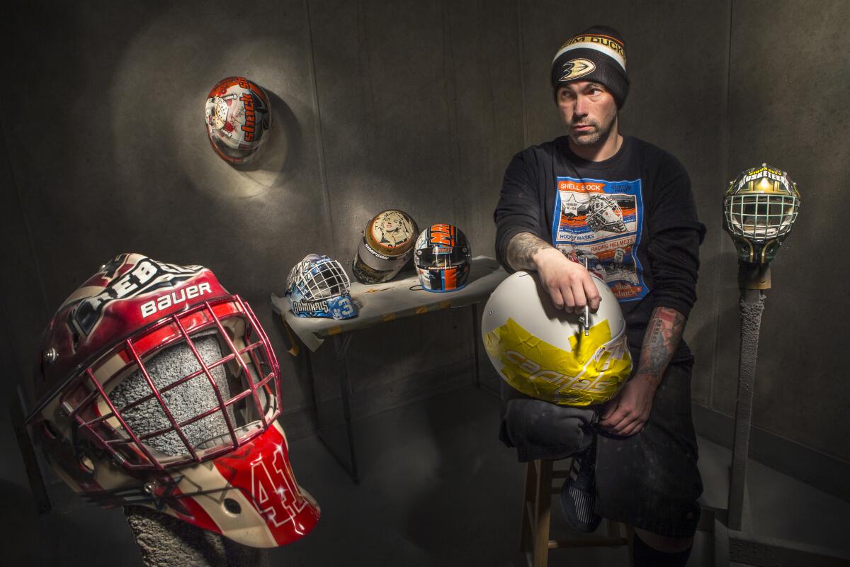 After a car crash injury prevented Noah Ennis from playing hockey, he managed to stay involved in the sport by painting goaltender helmets. 