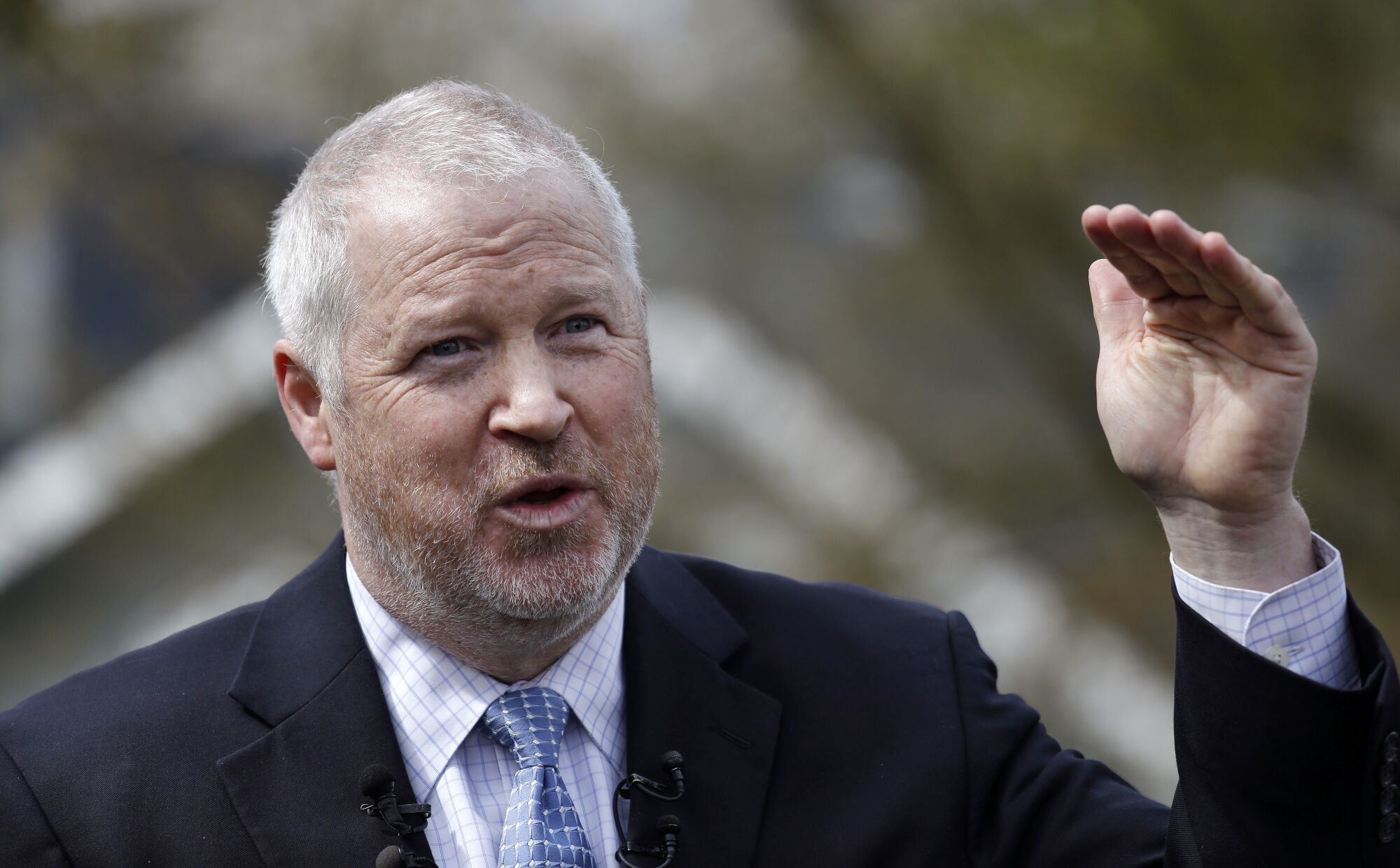 Mike McGinn holds a news conference in 2017 after announcing he'd run again for mayor of Seattle.