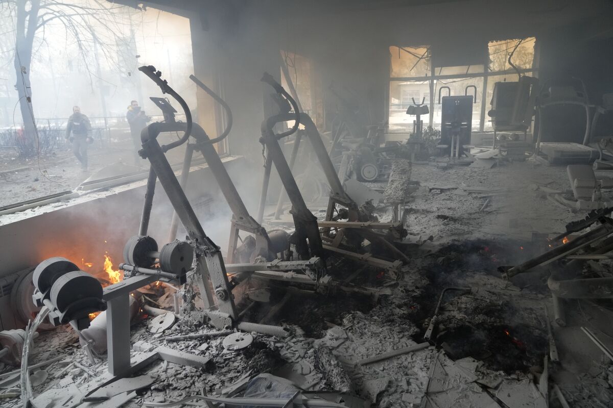 A view of smoke from inside a damaged gym following shelling in Kyiv, Ukraine.